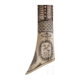 A Saxon miner's axe, dated 1686