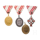 Vier Ehrenzeichen vom Roten Kreuz, um 1914