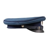 A peaked cap for officers (probably a military doctor) and an epaulette for a first lieutenant, World War I