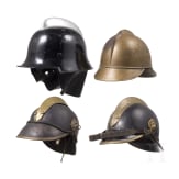 Four fire fighter helmets
