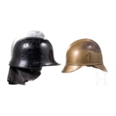 Four fire fighter helmets