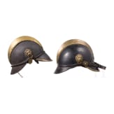 Four fire fighter helmets