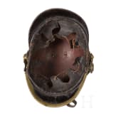 Four fire fighter helmets
