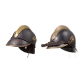 Four fire fighter helmets
