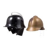 Four fire fighter helmets