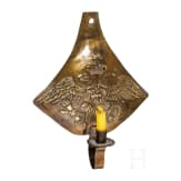 A Russian wall candleholder made from the forehead plate of a cuirassier helmet, circa 1830