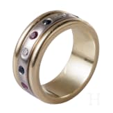 A 14ct white gold band ring set with diamonds, rubies and sapphires