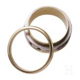 A 14ct white gold band ring set with diamonds, rubies and sapphires