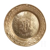 A North German or Dutch brass alms dish with Adam and Eve, 2nd half of the 18th century