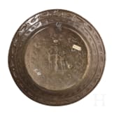 A North German or Dutch brass alms dish with Adam and Eve, 2nd half of the 18th century