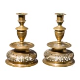A pair of German pierced bell-bottom candlesticks in the Nuremberg style of the 17th century, circa 1880