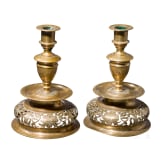 A pair of German pierced bell-bottom candlesticks in the Nuremberg style of the 17th century, circa 1880