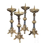 A set of four French gilt and enamelled pricket candlesticks in romanesque style, late 19th century