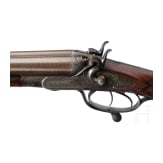A side-by side shotgun by J. Purdey in London