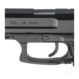 A Heckler & Koch MK 23 with suppressor, in box