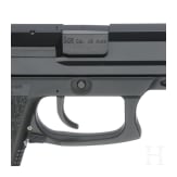 A Heckler & Koch MK 23 with suppressor, in box