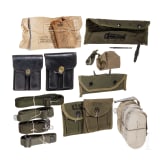 A group of US military equipment with sling, magazine pouches and cleaning accessories