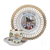 Geschenkteller und Tasse eines K&ouml;nigsulanen