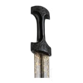 An Ottoman gold-inlaid khanjar with carved ebony handle, 19th century