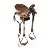 An Indopersian saddle with silver damascened stirrups, 19th century