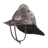 An English or Flemish lobster tail helmet with bar visor, circa 1640