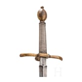 A small gilt German left-hand-dagger, circa 1600