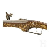 A long German wheellock pistol with lavish bone inlays, circa 1620