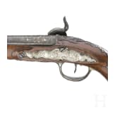 A German silver-mounted percussion pistol, circa 1780