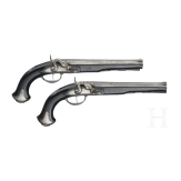 A cased pair of German percussion pistols by Johann Christoph Kuchenreuter in Steinweg near Regensburg, circa 1810