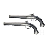 A cased pair of German percussion pistols by Johann Christoph Kuchenreuter in Steinweg near Regensburg, circa 1810