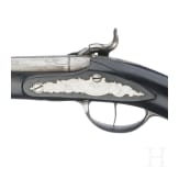 A cased pair of German percussion pistols by Johann Christoph Kuchenreuter in Steinweg near Regensburg, circa 1810