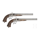 A pair of cased percussion pistols by Francis Marquis, Paris, circa 1840/50