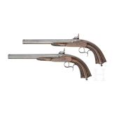 A pair of cased percussion pistols by Francis Marquis, Paris, circa 1840/50