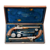 A pair of cased percussion pistols by Francis Marquis, Paris, circa 1840/50