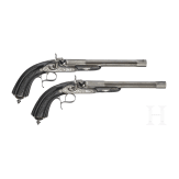 A pair of cased percussion pistols by Brun, Paris, circa 1850