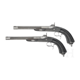 A pair of cased percussion pistols by Brun, Paris, circa 1850