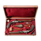A pair of cased percussion pistols by Brun, Paris, circa 1850