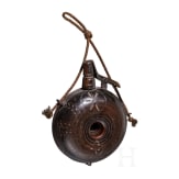 A small German military powder flask, early 17th century