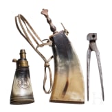 Two German powder flasks and a bullet mould, 19th century