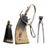 Two German powder flasks and a bullet mould, 19th century