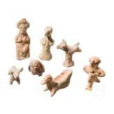 Sieben Votivfiguren aus Ton, meist griechisch, teils altorientalisch, 2. Jtsd. v. Chr. - 4. Jhdt. v. Chr.