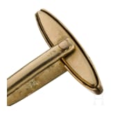 Ein Paar gro&szlig;e goldene Manschettenkn&ouml;pfe