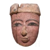 A painted wooden mummy mask, Late Period, mid-3rd of the 1st millennium B.C.
