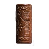 Ancient Babylonian cylinder seal made of brown jasper depicting a cult scene, approx. 1900&ndash;1700 B.C.