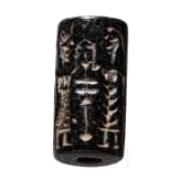 Ancient Babylonian cylinder seal made of brown jasper depicting a cult scene, approx. 1900&ndash;1700 B.C.