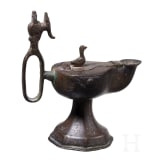 A bronze Ottoman oil lamp, Seljuk, 12th - 13th century