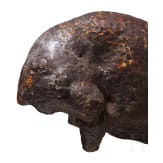 An amber figure of a lying bull, Greek, 4th century B.C.
