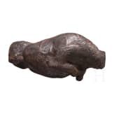 An amber figure of a lying bull, Greek, 4th century B.C.