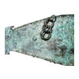 An early Etruscan belt fitting with clasp hook, mid-8th century B.C.