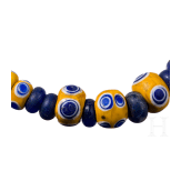 43 yellow-based and 42 dark blue glass beads, Celtic, 5th&ndash;4th century B.C.
